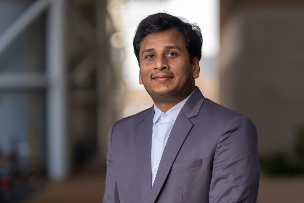 Uday Vaddevolu, Ph.D. He is wearing a gray jacket with a light blue dress shirt.