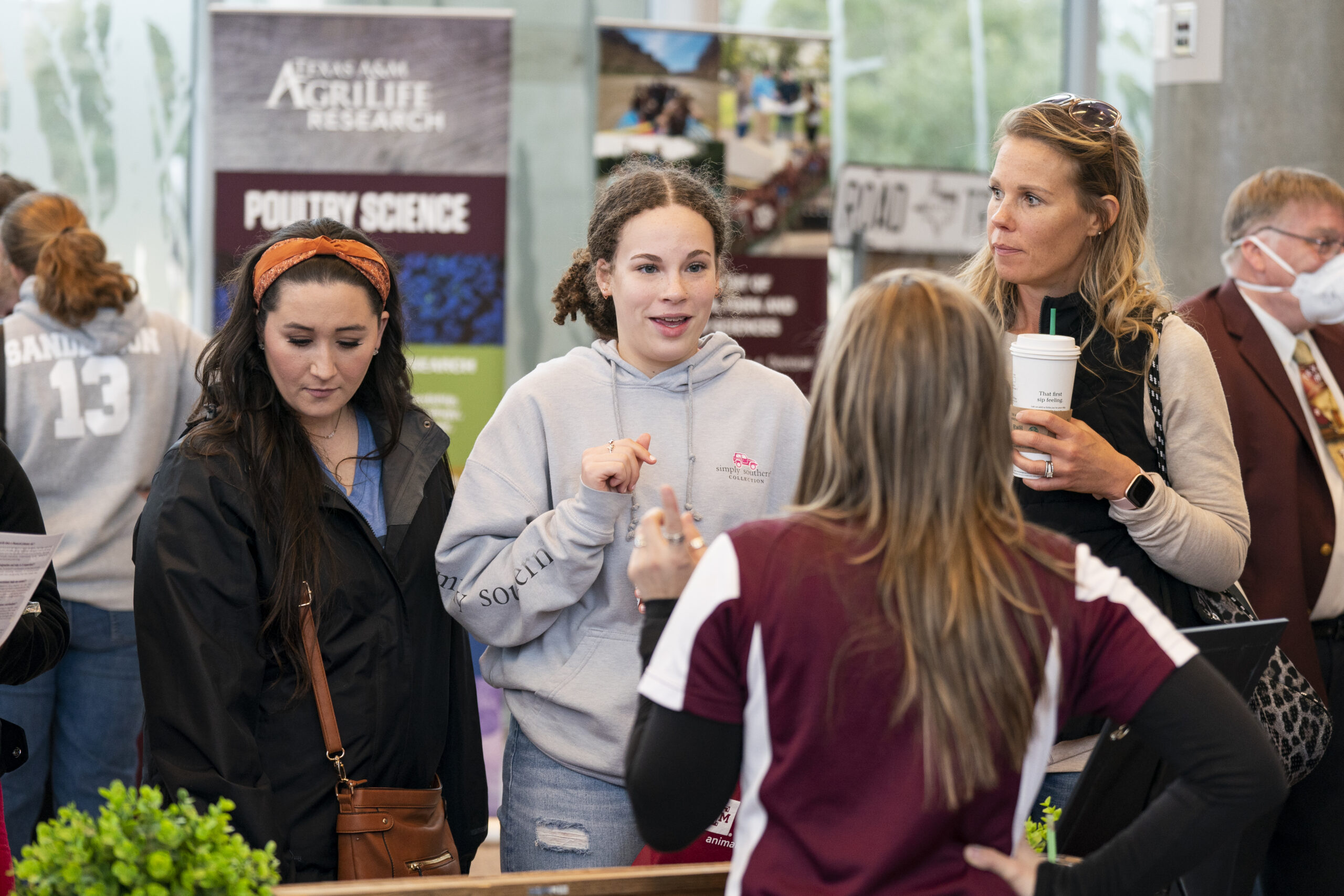 Students talking to one another and networking
