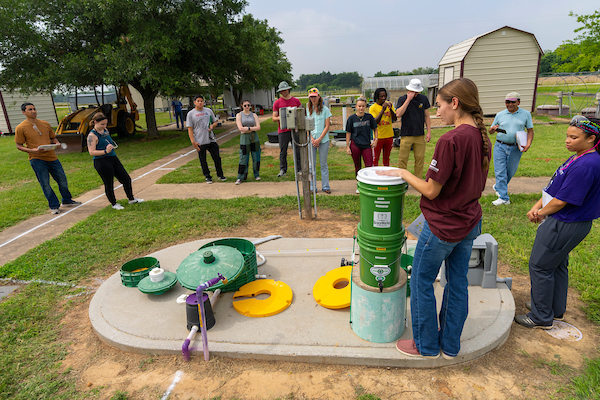 Reuse Water Quality Research and Extension Experience for Undergraduates (REEU) class out in the field